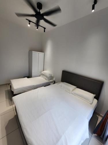 Una cama o camas en una habitación de The Horizon - Ipoh