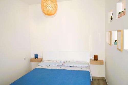 Un pat sau paturi într-o cameră la Casa Vista Mare a Casal Velino