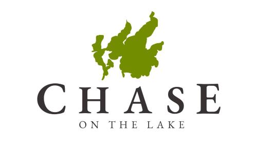 a logo for chasis on the lake at Chase On The Lake in Walker