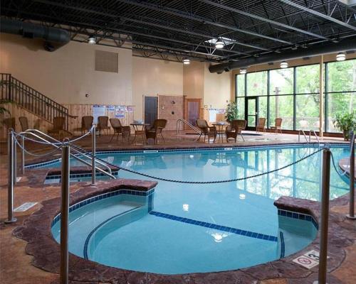 a large swimming pool in a large building at Chase On The Lake in Walker
