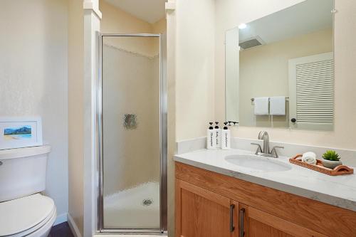 a bathroom with a shower and a sink at Kaha Lani #222 in Lihue
