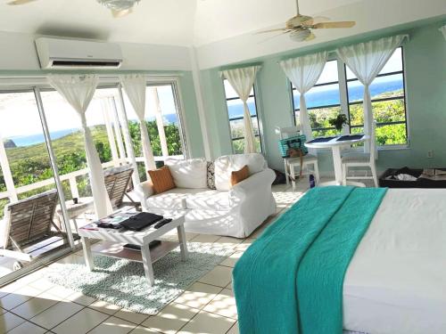 A seating area at Dragon Cay Resort Mudjin Harbour