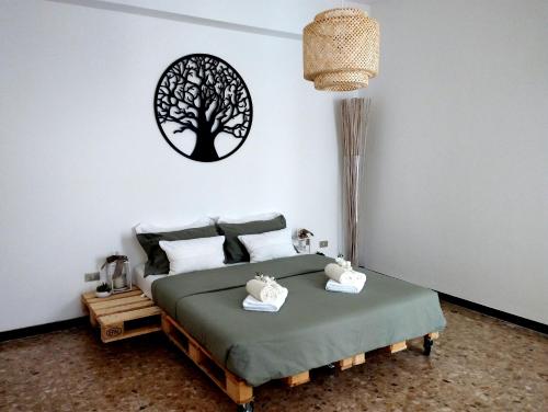 A bed or beds in a room at Casa Ida