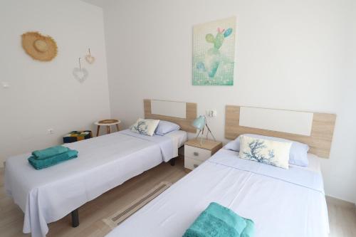 Posteľ alebo postele v izbe v ubytovaní Apartment Infinity Beach, edf Pinada Beach, La Mata, Torrevieja