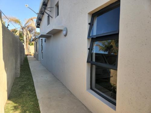 a building with a window on the side of it at 9 Levubu Cottages in Polokwane
