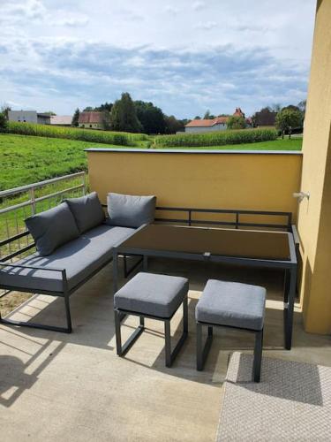 Ein Sitzbereich in der Unterkunft Appartement Herzer