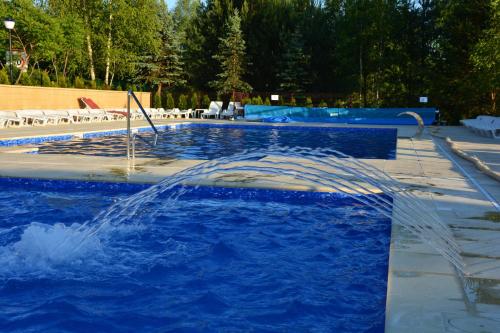 Bazén v ubytování Hotel Kormoran Resort & SPA nebo v jeho okolí