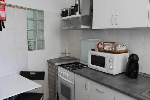 Η κουζίνα ή μικρή κουζίνα στο Morgado Guest House
