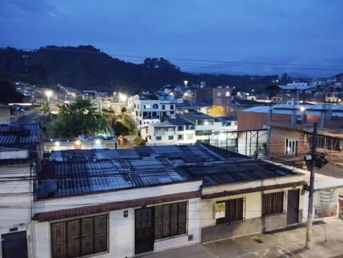 a view of a city at night at Mi casa tu casa in Santa Rosa de Cabal