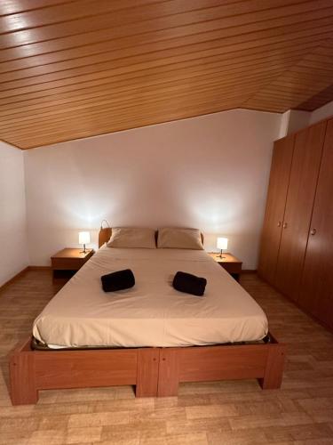Säng eller sängar i ett rum på Appartamentino via Aquileia
