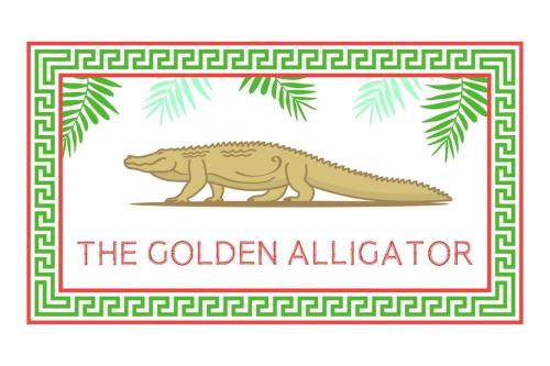 an illustration of a dinosaur with the golden alligator label at The Golden Alligator 2 - 3 beds 1 bath Palm Beach Regency style, near everything in West Palm Beach