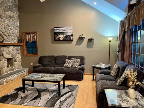 a living room with a couch and a table at Mountain house in Palmerton