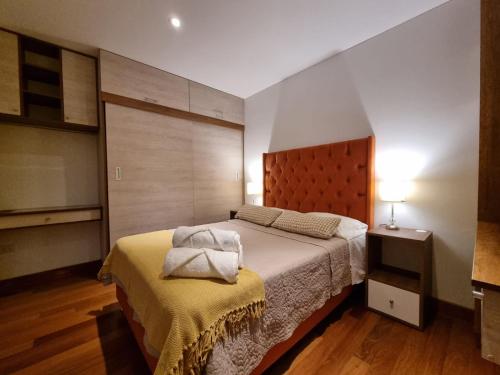 Ένα ή περισσότερα κρεβάτια σε δωμάτιο στο Departamento estreno 2do piso