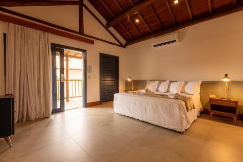 Cama o camas de una habitación en Pousada Alto da Pipa