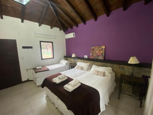 Кровать или кровати в номере Hotel Las Chirimoyas