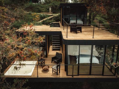 an aerial view of a house with a deck at Porto Marina Hotel in Guatapé