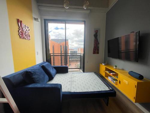 TV a/nebo společenská místnost v ubytování Loft en Chapinero con todo lo que necesitas !