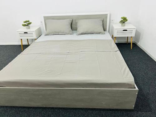 Ένα ή περισσότερα κρεβάτια σε δωμάτιο στο Leos Dream Apartment