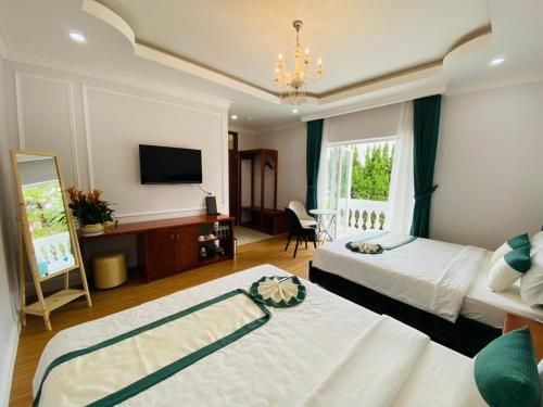 Peach Valley Hotel Dalatにあるベッド