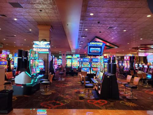 a casino with a bunch of slot machines at Comfy Unit at Orleans Casino Strip Las Vegas in Las Vegas