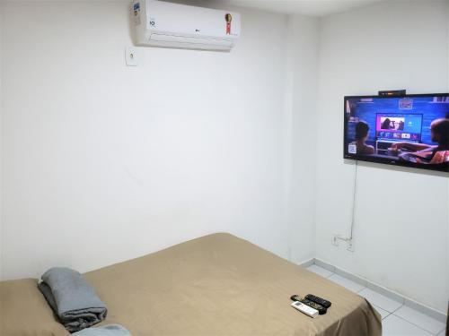 เตียงในห้องที่ Apto COMPLETO prox a UEPB, ar cond wifi