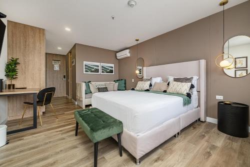 Ein Bett oder Betten in einem Zimmer der Unterkunft Apartamentos Go Living & Suites by HOUSY HOST