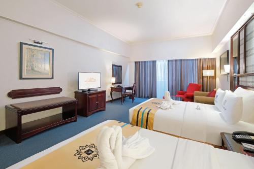 Sunlake Waterfront Resort & Conventionにあるベッド