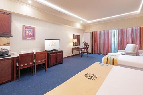 Sunlake Waterfront Resort & Conventionにあるベッド