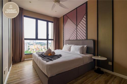 a bedroom with a bed and a large window at Millerz Square Kuala Lumpur, Travelet in Kuala Lumpur