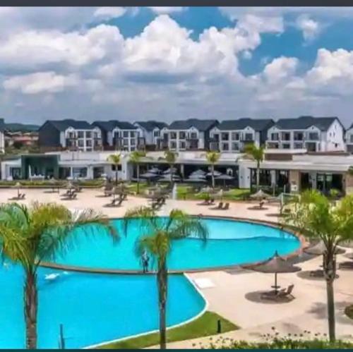 a view of the pool at the resort at The Blyde Crystal Lagoon By Damo in Pretoria