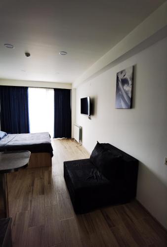 Postel nebo postele na pokoji v ubytování Gudauri appartement