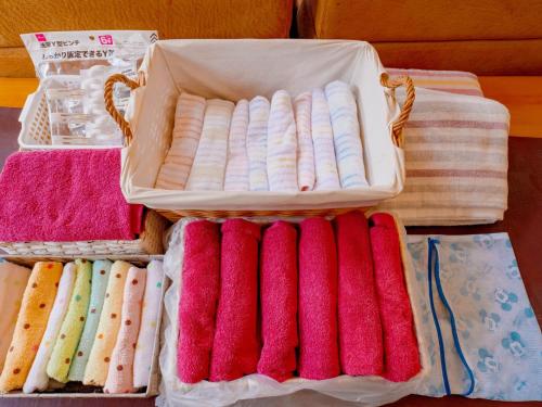 a bunch of towels in baskets on a table at Ikinomannaka - Vacation STAY 58080v in Iki