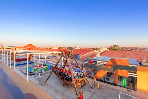 an overhead view of a water park with a roller coaster at Neverland City Hurghada - Pickalbatros in Hurghada