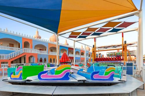 a roller coaster ride at an amusement park at Neverland City Hurghada - Pickalbatros in Hurghada