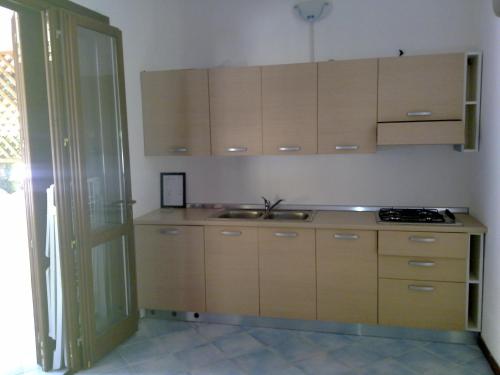 Η κουζίνα ή μικρή κουζίνα στο Villaggio La Marée