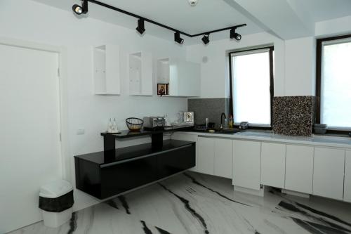 Η κουζίνα ή μικρή κουζίνα στο Niro Residence
