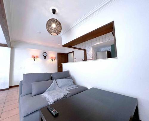 a living room with a couch and a mirror at NEW OPEN 4BR, 110㎡ Walk to Asakusa in Tokyo