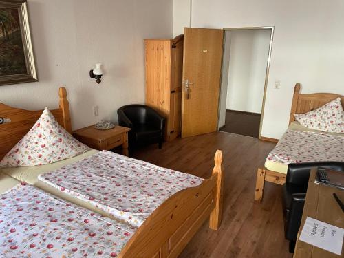 Ein Bett oder Betten in einem Zimmer der Unterkunft Hotel Klement