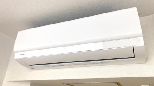 a white theater system on the ceiling of a room at Toyoko Inn Tokyo Minami-machida in Machida