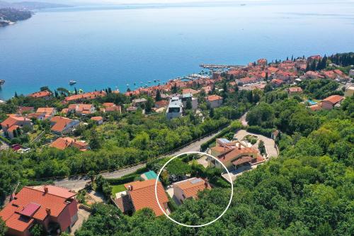 an aerial view of a town with houses and the water at Apartment FERIA 1 in Opatija