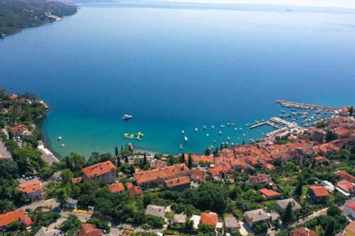 an aerial view of a lake with boats in the water at Apartment FERIA 1 in Opatija