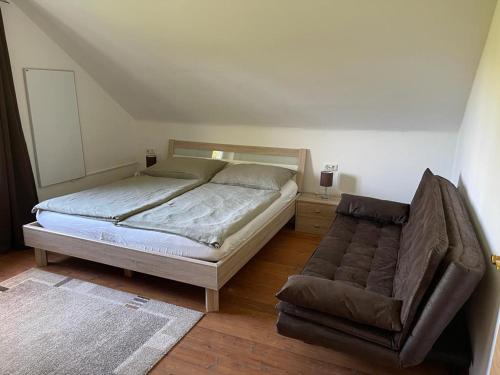 Ferienhaus Murtal tesisinde bir odada yatak veya yataklar