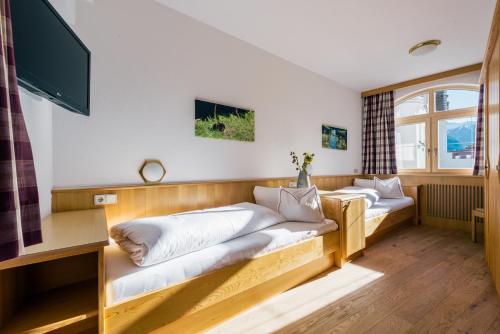 Un pat sau paturi într-o cameră la Bischoferhaus
