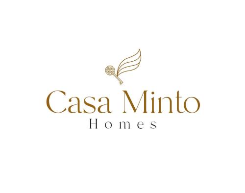a logo for casa minivo homes at Sober 2bhk Pet Friendly Apartment with pool view in Marmagao