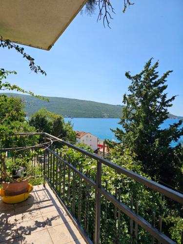 a balcony with a view of a lake at SeaView Zelenika in Herceg-Novi
