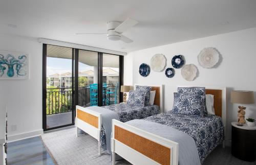 Ένα ή περισσότερα κρεβάτια σε δωμάτιο στο Blue Haven Unit B416