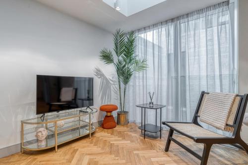 TV o dispositivi per l'intrattenimento presso Luxury flats near Big Ben and London Eye