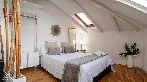 Ένα ή περισσότερα κρεβάτια σε δωμάτιο στο Living4Malaga Calderón de la Barca