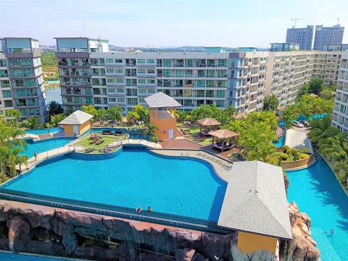 an aerial view of a large swimming pool at a resort at Laguna Beach Resort 3 Maldives in Jomtien Beach