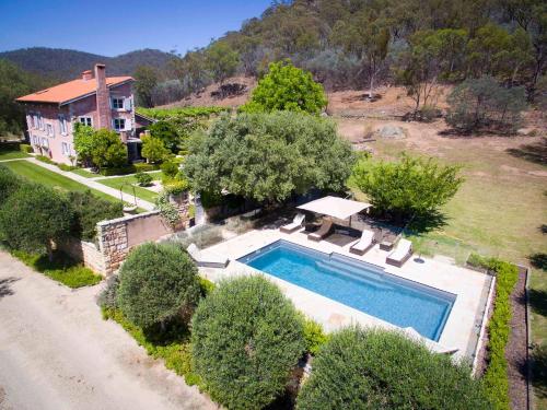 an aerial view of a house with a swimming pool at Talits Estate Vineyard in Broke